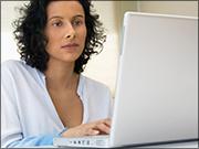 Woman working at laptop